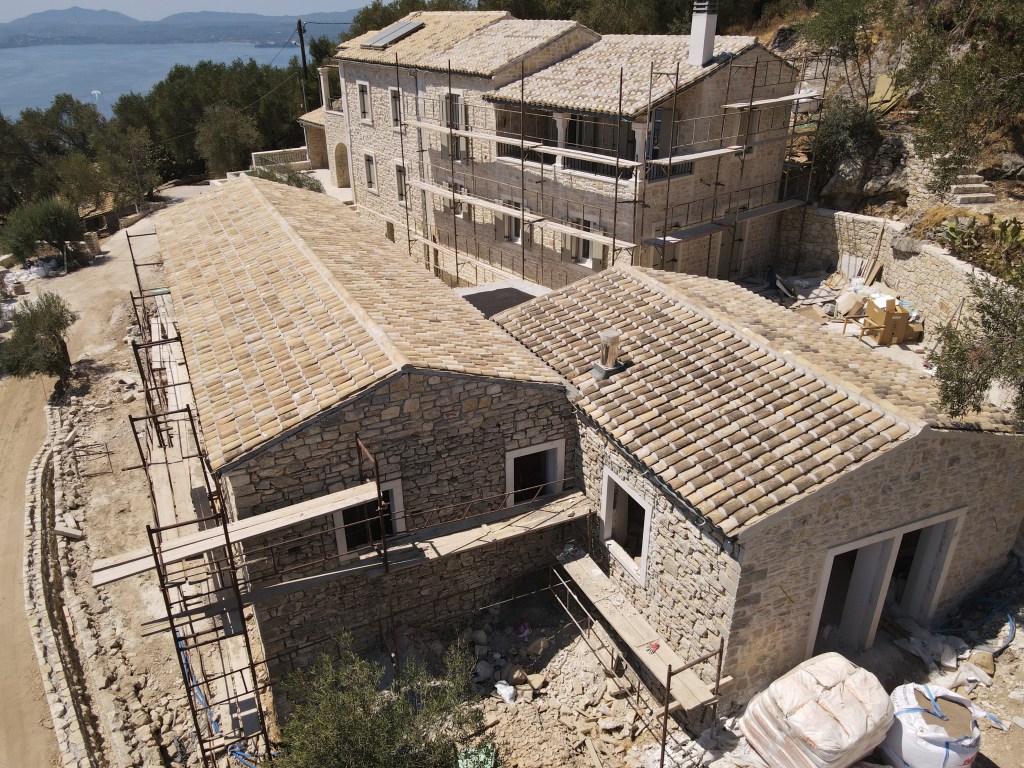 Contemporary roofs made of classc tiles in Corfu, Greece.